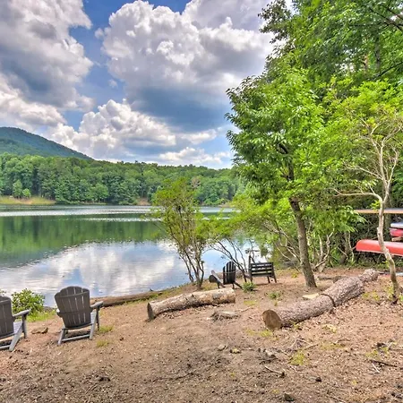 Lakefront Glass House Cabin With Mountain Views!